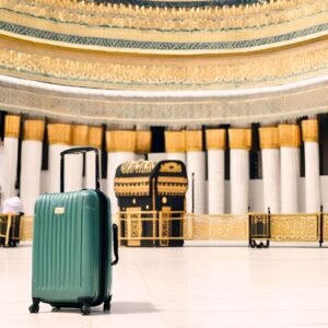 The Kaaba with a travel suitcase